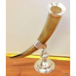 A large silver plated cornucopia horn vase on stand