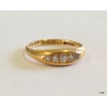 An 18ct gold diamond 5 stone ring size N
