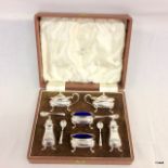 A boxed Walker and Hall silver plated pepper and mustard set