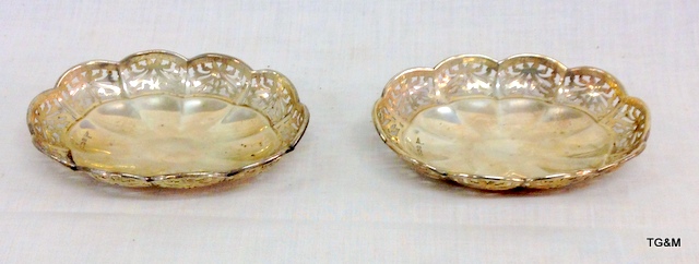 A pair of silver Walker and Hall embossed bon bon dishes 12 x 9cm