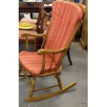 An Elm polished rocking chair