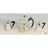 A silver plated coffee pot and 2 water jugs