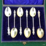 A boxed set of silver Apostle Spoons