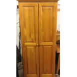 A pine single wardrobe