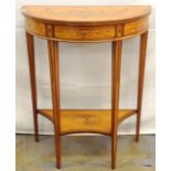 An inlaid demi-lune table with tapered legs 1 drawer and low shelf in the Sheridan style 75 x 61 x