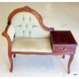 A carved mahogany telephone seat with green velvet seat and drawer 85 x 94 x 42cm