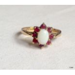 A 9ct gold opal and garnet ring size N