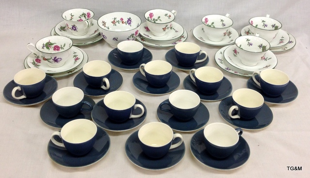 A selection of Poole coffee cups and Southerland china trios