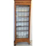 A Walnut leaded glass door bookcase 203 x 69 x 20cm