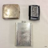 A silver cigarette case, a Zippo lighter and a pewter hip flask