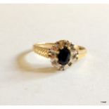 A 9ct gold sapphire and diamond ring size N