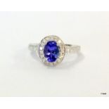 An 18ct white Gold tanzanite and diamond ring with central stone approx 1.5ct