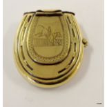 A brass cased Vesta case in a lucky horseshoe  shape