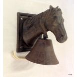 Cast iron bell in the form of a horse