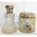 A pair of silver topped dressing table jars