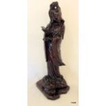 Tall Chinese carved rootwood figure of Guanyin