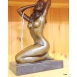 An erotic figure of a bronze lady