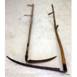 2 wooden handled scythes 172cm long and 160cm long