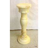 An Alabaster plinth round top 75 x 24cm