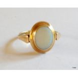 A 9ct gold opal ring size Q