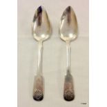 A pair of shell pattern silver spoons made in Finland, date marked 1846