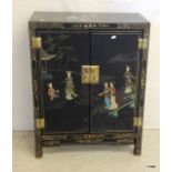 A Chinese Lacquer cabinet 77 x 58 x 29cm