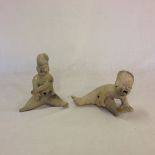 Two Chinese clay babies