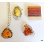 4 items of silver and Amber (2 pendants and 2 brooches)
