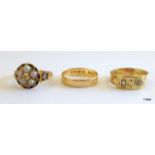 A gold diamond and emerald ring dated 1860 and diamond and gold ring and 18ct gold wedding band
