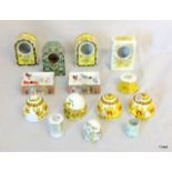 A Halcyon Days Enamels collection of 14 clock casings, eggs, box bases and others