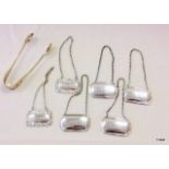 6 x silver decanter labels and pair of silver sugar nips/tongs
