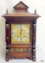 A German striking bracket clock in a mahogany case with brass mounts and brass face 47 x 30 x 21