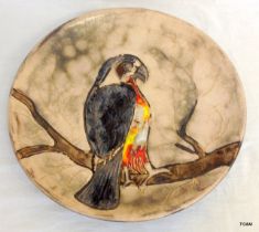 A German Art Pottery charger depicting a Parrot 36cm diameter