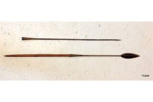 An African metal spear with a wooden middle shaft