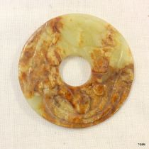 Chinese Russet Jade Bi Disc carved with scrolling mythical beast