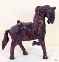 A Chinese wooden carved horse 38 x 34 x 11cm