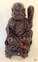 Chinese carved rootwood figure of a Buddha