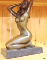 An erotic figure of a bronze lady