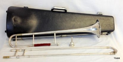 A cased Class A ex Salvation Army white metal trombone