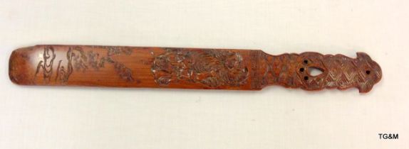 An Oriental antique carved wooden page turner circa 1900. 43cm