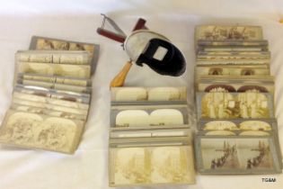 An HC White & Co stereoscope view finder with 85 view cards including transportation people and