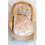 A rattan chaise lounge