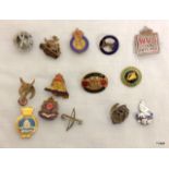 A selection of 15 military and home front lapel badges