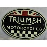 A cast 'Triumph' Sign