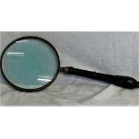 A 6" silver plated magnifying glass