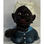 Novelty money bank in the form of a negro woman