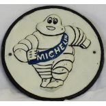 A round cast 'Michelin' Sign