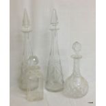 Four mixed decanters