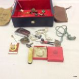 A box containing various interesting items to include lead soldiers and scouting memorabilia