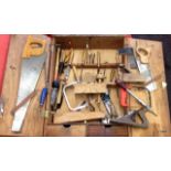 Vintage wood working tools in wall hanging cabinet